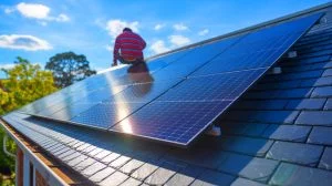 Illustration of innovative film-type chalcopyrite solar cells designed for low load-bearing roofs, generated by artificial intelligence.