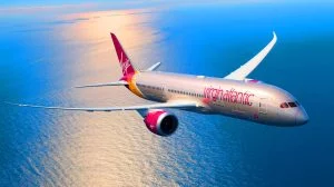 Illustration of Virgin Atlantic's Boeing 787 completing the first transatlantic flight powered entirely by Sustainable Aviation Fuel, generated by artificial intelligence.