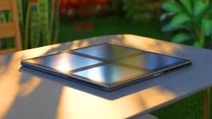 Illustration of the Lenovo Yoga Solar laptop featuring integrated mini photovoltaic modules, an artificial illustration.