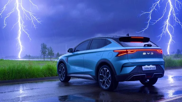 BYD Song Plus Stuns Engineers as “Steel Cage Eats Lightning Alive” and Protects Every Component in Extreme Storm Illustration of a BYD Song Plus electric vehicle enduring multiple lightning strikes.