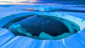 Illustration of NASA's radar survey revealing the buried Camp Century beneath Greenland's ice sheet.
