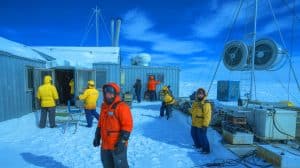 “Antarctic Workers Getting Sexually Assaulted”: 40% Report Harassment While Trapped With Abusers For Months In Frozen Research Stations Illustration of Antarctic research base workers confronting harsh conditions and workplace misconduct challenges.