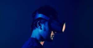 How Science and Technology Are Changing Popular Types of Entertainment man in black crew neck shirt wearing black headphones