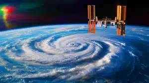 Illustration of NASA's International Space Station detecting unseen atmospheric waves above Earth during Hurricane Helene.