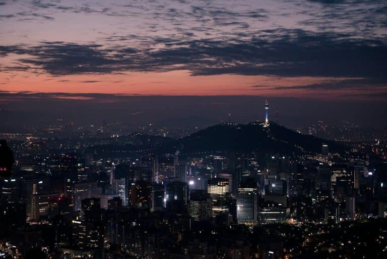 Korean Companies Are Losing Ground to China: Why Governance Failures at Conglomerates Like Young Poong Group Matter More Than Ever lighted city skyline at night